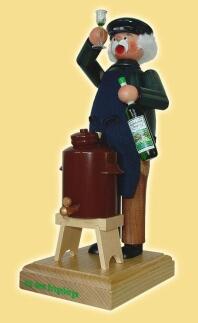 Räuchermann – traditioneller Schnapsbrenner mit blauer Schürze, Destille und Flasche, bunt bemalt –