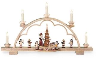 Schwibbogen – liebevolle Bescherungsszene mit Weihnachtsmann, Schlitten und Spielzeug, naturfarben,