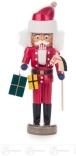 Nussknacker Weihnachtsmann rot, mit Steckenpferd und Geschenken Breite x Höhe x Tiefe 5,5 cmx14,5 cmx5 cm
